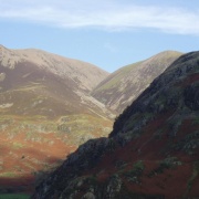 Looking from the opposite side of Crummock water and Low fell runs between the two mountains