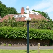 A sign post in the village of Holford on the edge of the Quantock hills in somerset