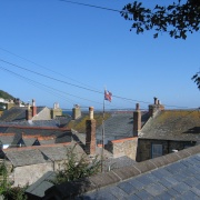 Mousehole in Cornwall - rooftops and sea