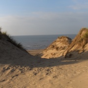 Sun, sand, sea and shadow with a touch of blue sky - Formby coast....
