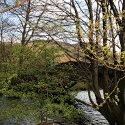 Stone bridge at Rosthwaite on river Derwent