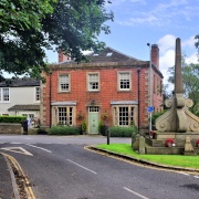 The Jebson Memorial and the Manor House at West Bretton.