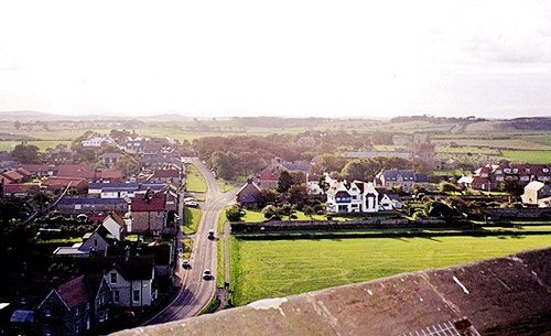 View of Bamburgh village from the high castle walls.