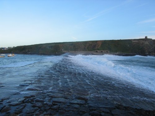 Waves rushing over the Breakwater