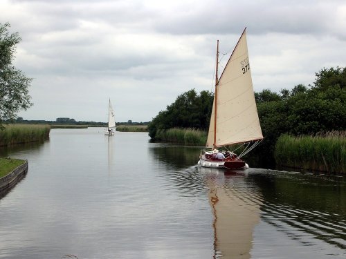 Sailing on the Norfolk Broads near Potter Heigham.
