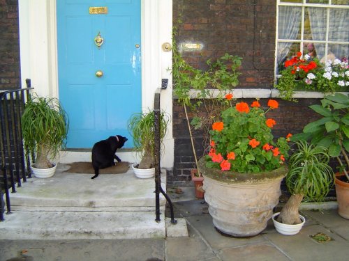 The blue door of a residence at the Tower of London