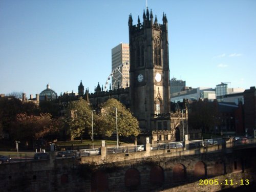 Manchester Cathedral seen from Salford side of the River Irwell