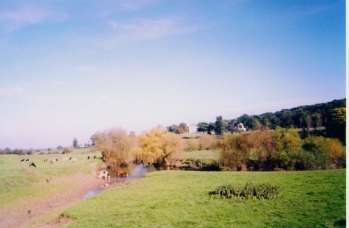 view across the River Lugg to Sufton Court. Mordiford, Herefordshire