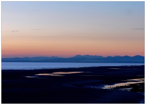 Cleveleys, Lancashire. View across Cleveleys Beach to the Lake District (Night Shot).