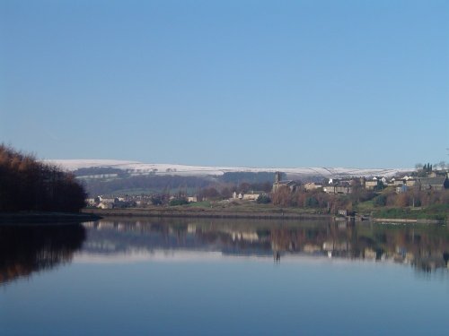 Looking across Bottoms reservoir towards Tintwistle & Christ Church, Derbyshire