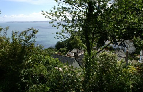 Clovelly, Looking down on the rooftops from the path leading down to the village. Devon, July 2006