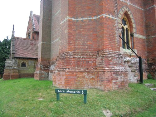 Sign leading to the Alice Memorial at Saint Michael and All Angels Church, Lyndhurst, Hampshire