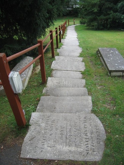 Steps made up of headstones at Saint Michael and All Angels Church, Lyndhurst, Hampshire.