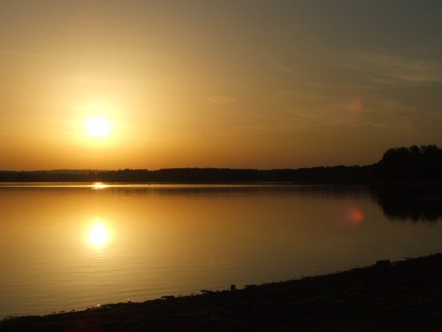 Sun setting on Rutland Water taken September 2006