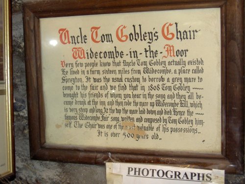 Uncle Tom Cobley's Chair wall plaque in Tom Cobley's Chair shop, Widecombe in the Moor, Devon.