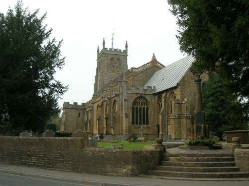 All Saint's Church with Rememberance Day monument in foreground, Martock, Somerset