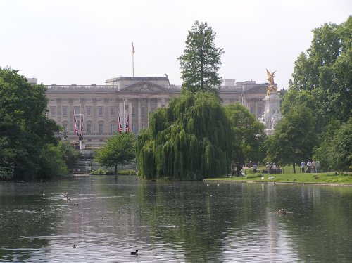 A view of Buckingham Palace across the St James Park lake, central London.