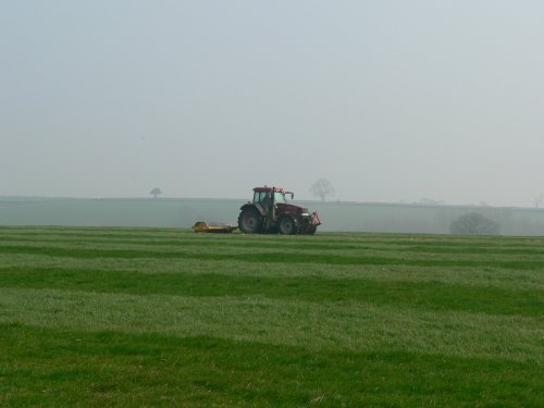 rolling a field in rural Somerset