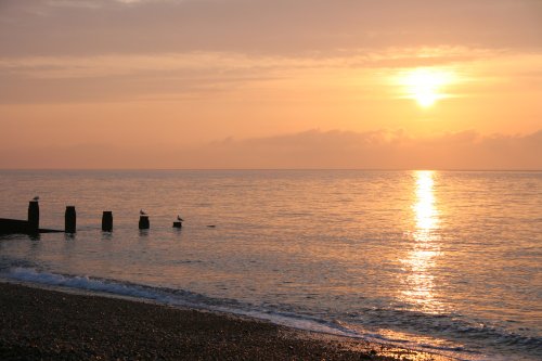 Eastbourne beach as the sun starts to rise