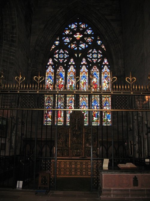 The altar and the stained glass in St. Wilfrid's Chapel
