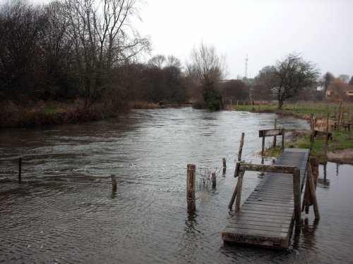 In flood, the river Wyley at Great Wishford, Wiltshire