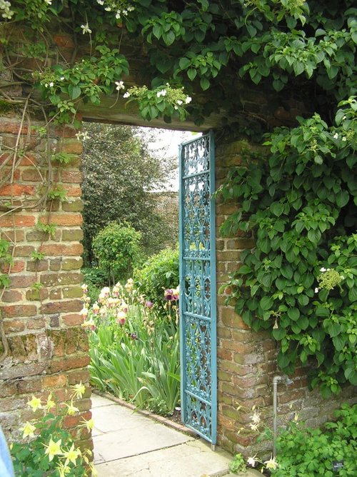 Gateway between gardens at Sissinghurst, Kent