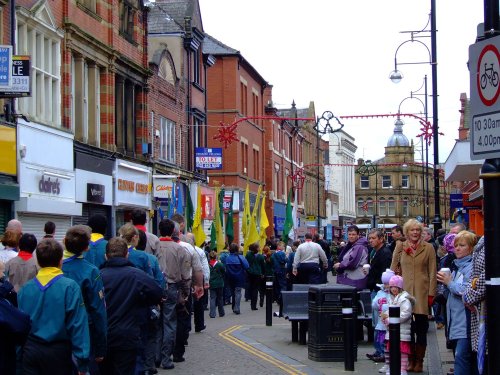The parade marches to the town hall