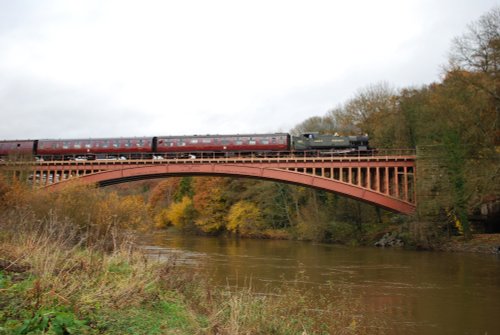 Steam train over the Victoria Bridge at Arley