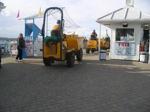 Dump trucks on the pier.