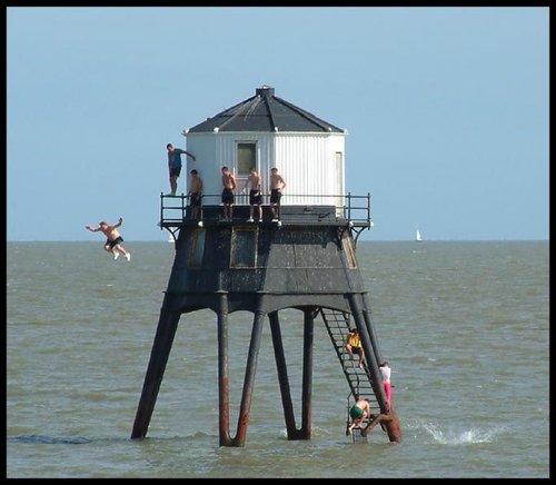 Jumping into the sea from the old tower