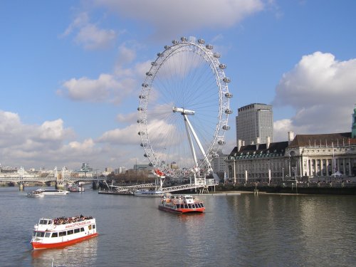 The London Eye with boats.