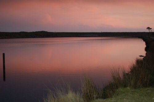 Sunset over Big pond on Dartmoor.