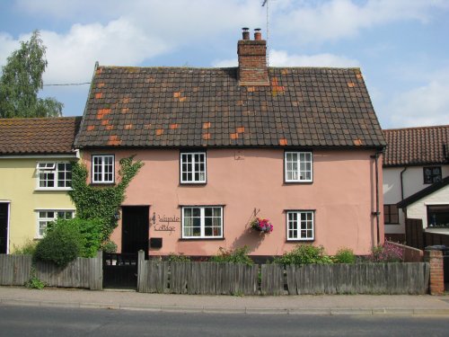 A Suffolk pink house in the street