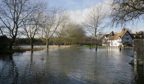 The flooded Eynsford Village by the River Darent