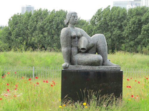 Woman And Fish Statue