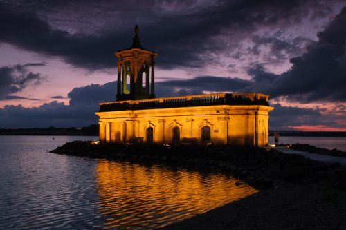 The Normanton Church illuminated at night.