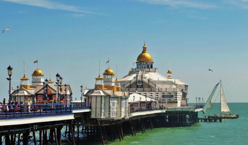 Eastbourne Pier with sail boat