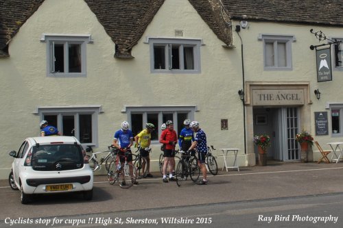 Cyclist in High Street, Sherston, Wiltshire 2015