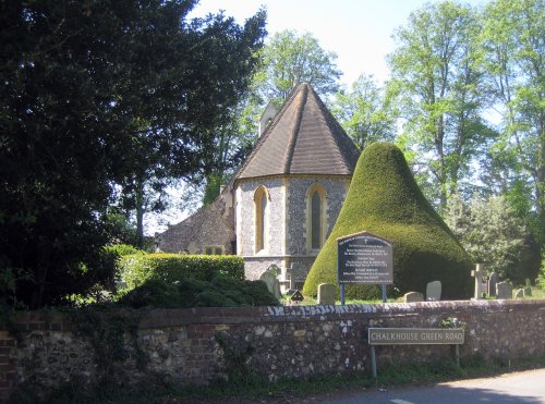 The Church of St. John the Baptist, Kidmore End and one of the magnificent yews in the churchyard