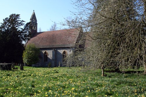 St. Mary's Church, Pyrton, with spring daffodils in the churchyard