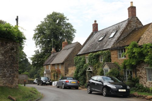 Local honey ironstone cottages in East End, Swerford