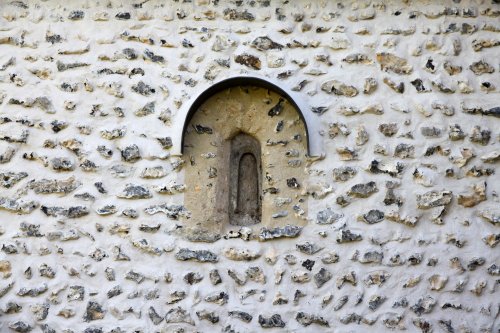 The rare Saxon window in St. Andrew's Church