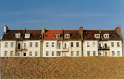 Houses along the beach in Seaford in Sussex.  Taken in spring of 1999