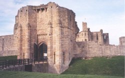 View of Warkworth's castle gate structure.