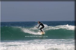 Surfing at Fistral Beach Wallpaper