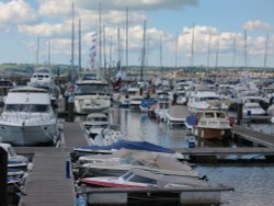Torquay harbour with Paignton in the background Wallpaper