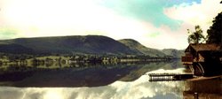 Mirror smooth Lake Ullswater, Cumbria. Wallpaper