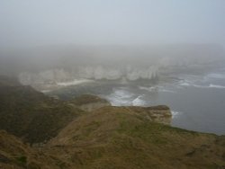 Selwicks Bay, Flamborough, East Yorkshire. Shrouded in Mist on a Crisp March Afternoon Wallpaper