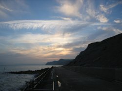 Clouds resembling a giant feather in the sky