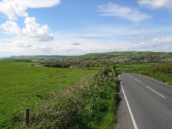 A distant view of Burton Bradstock, Dorset Wallpaper